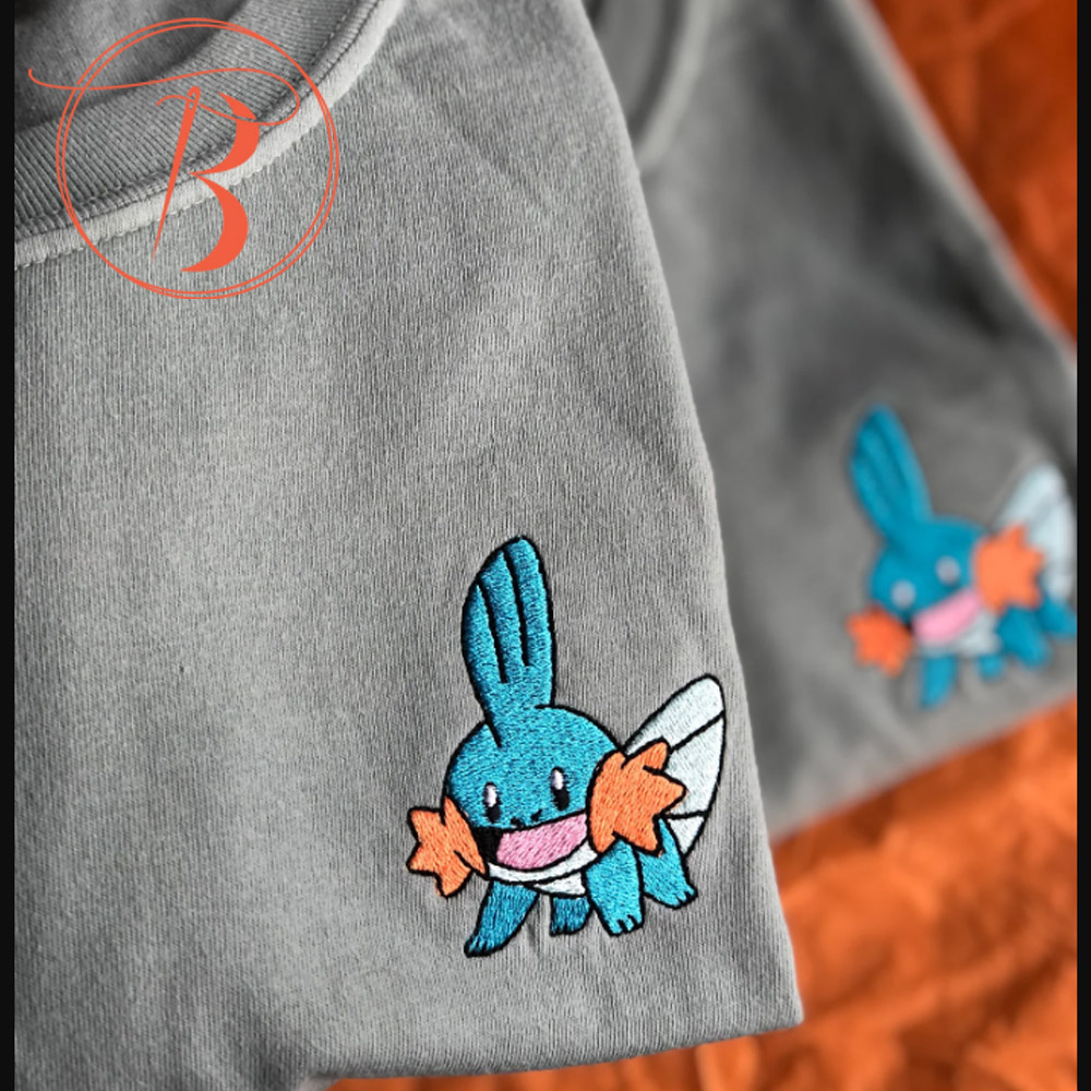 JWNsev1k-pokemon-mudkip-embroidered-crewneck_1675674764Qw.jpg