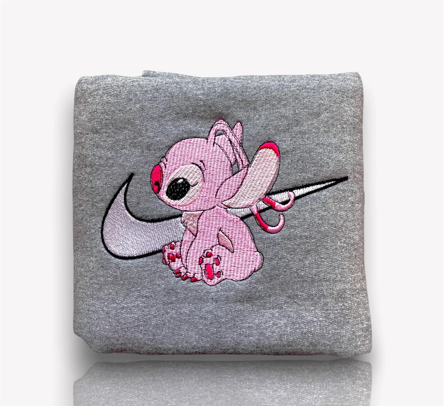 angel-disney-nike-embroidered-sweatshirts_1665388661fI.jpeg