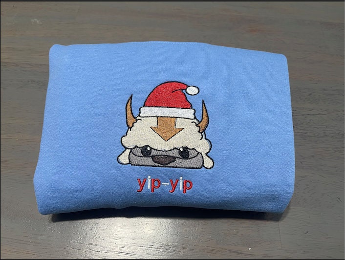 appa-avatar-in-a-christmas-hat-embroidered-sweatshirt-shirt_1670320145.jpg