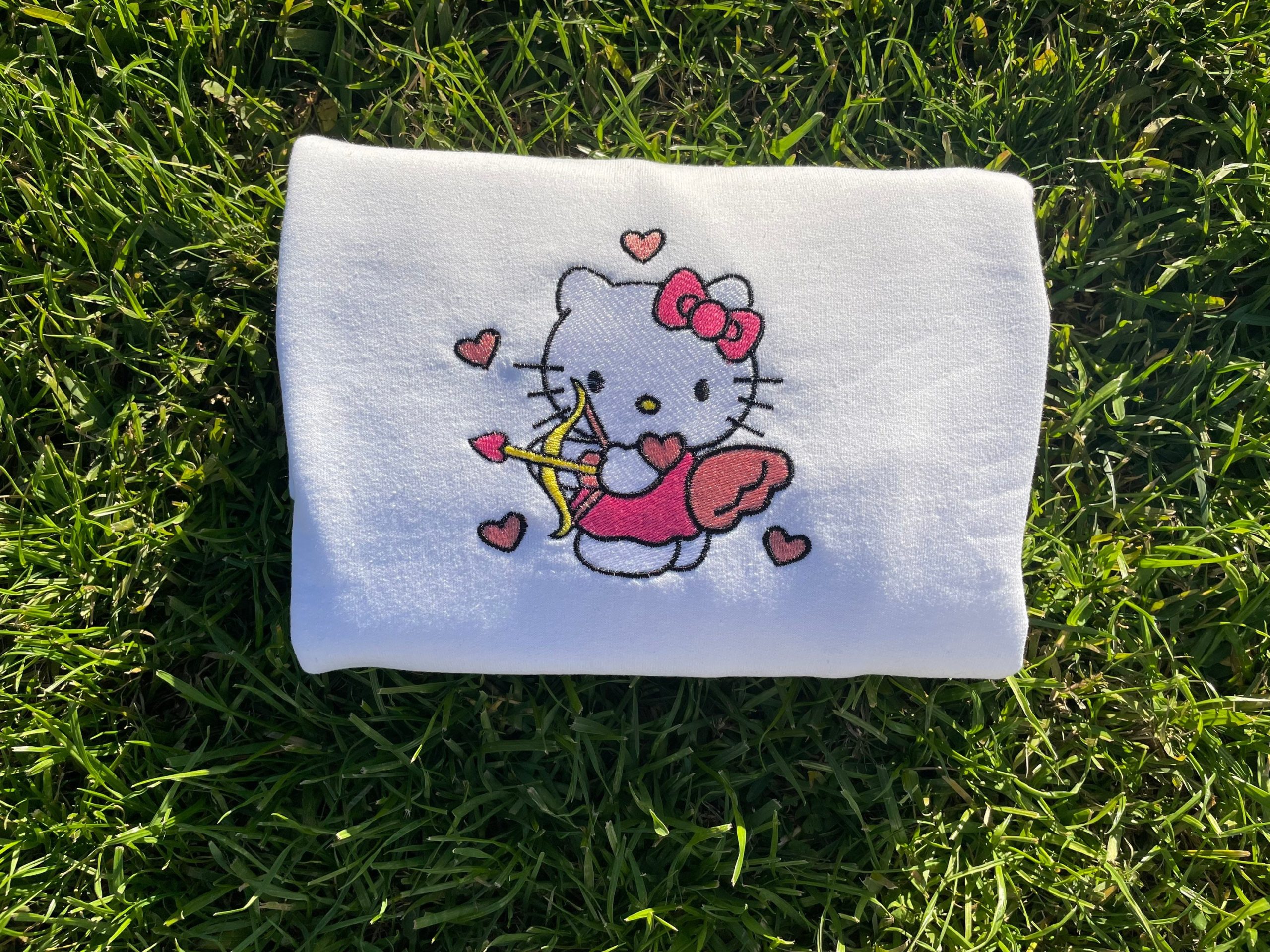Embroidered Hello Kitty Cupid Crewneck - Shop Online for Unique Designs