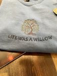 Shop the Exclusive Taylor Swift Life Was A Willow Evermore Embroidered Crewneck