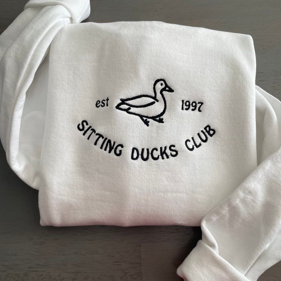 sitting-ducks-est-1997-embroidered-sweatshirts_1678990427.jpg