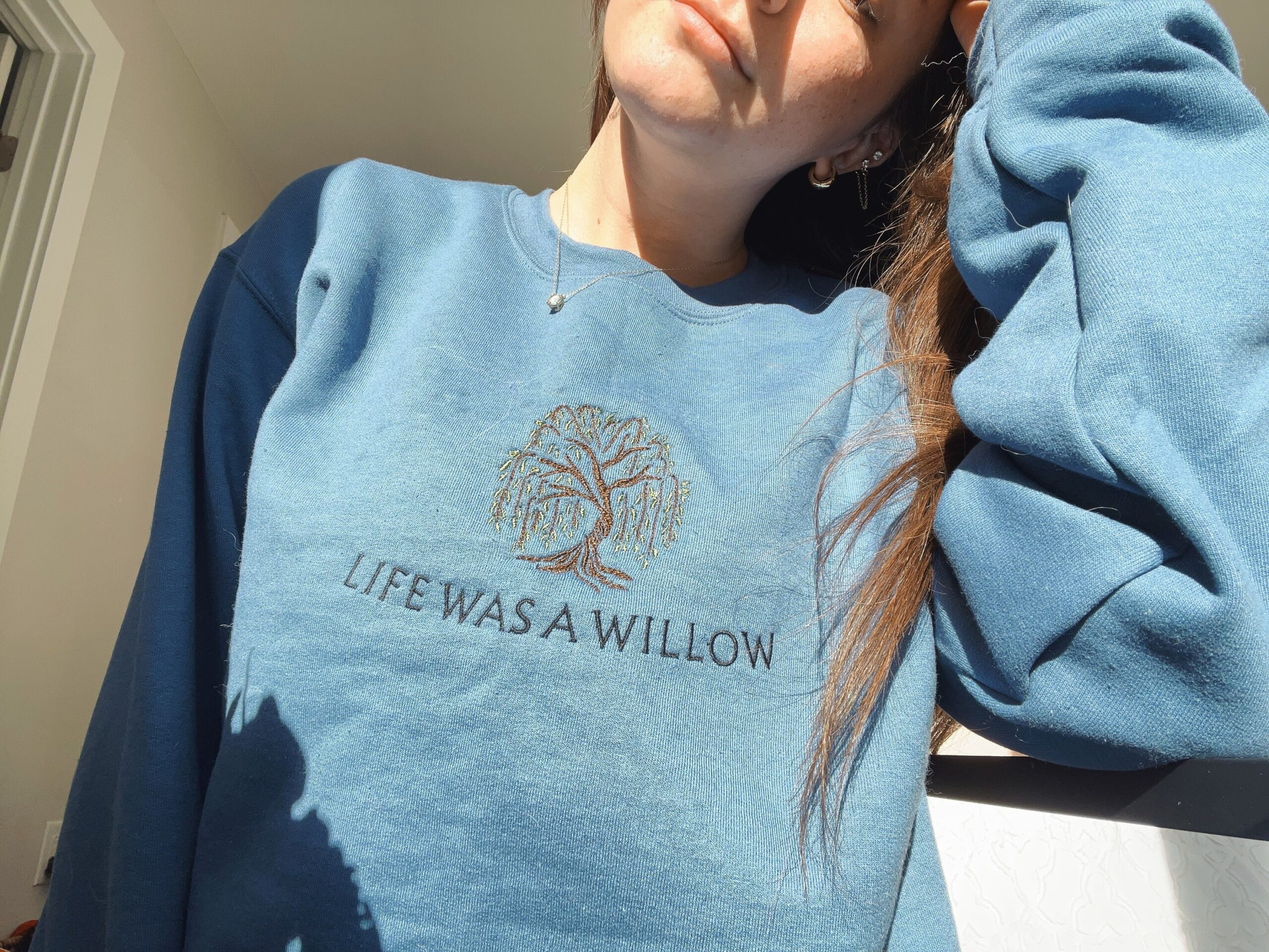 taylor-swift-life-was-a-willow-evermore-embroidered-crewneck_1668809044-scaled-1.jpg
